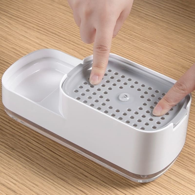 Wasmiddeldispenser en sponshouder voor gootsteen
