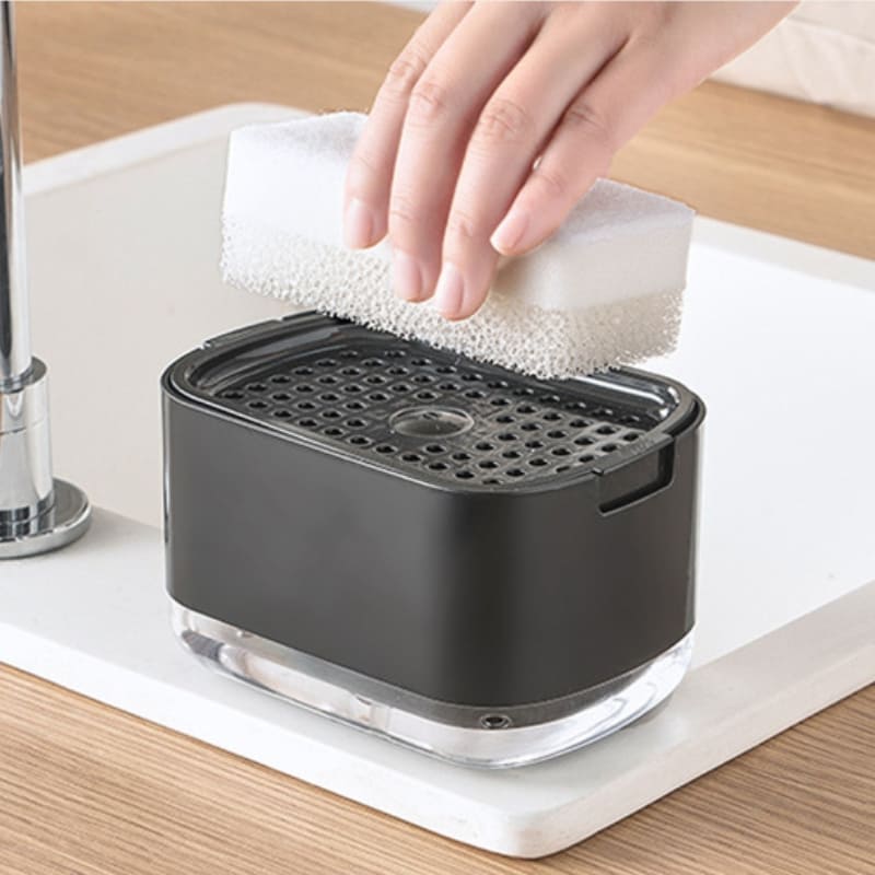 Wasmiddeldispenser en sponshouder voor gootsteen